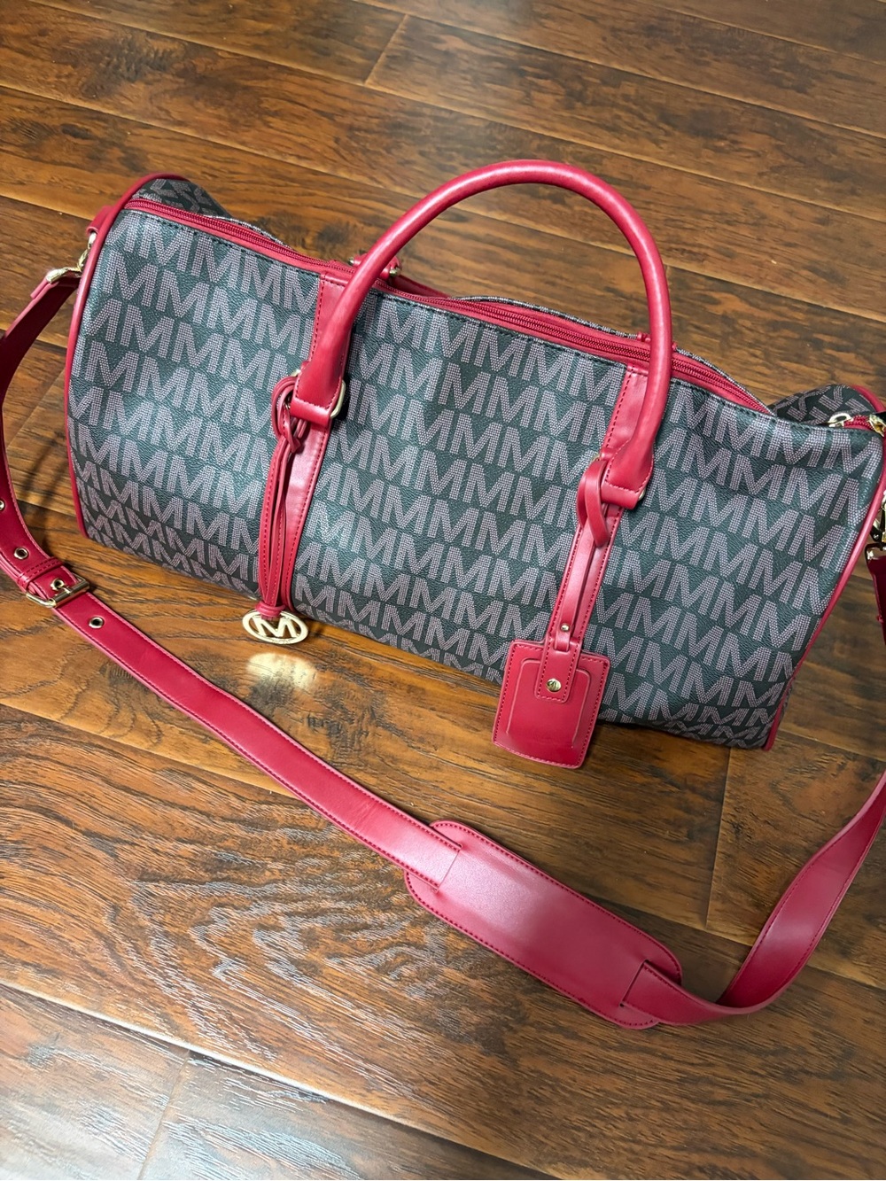 Milan duffel/weekender style bag with coated canvas & red trim